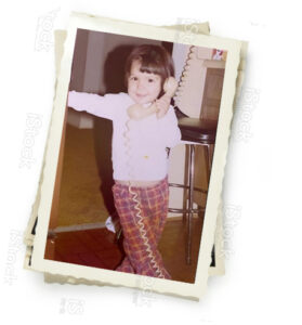 Jennifer Lee on the telephone as a little girl